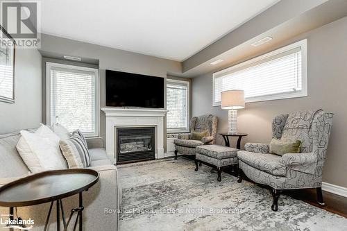 308 - 4 Brandy Lane Drive, Collingwood, ON - Indoor Photo Showing Living Room With Fireplace