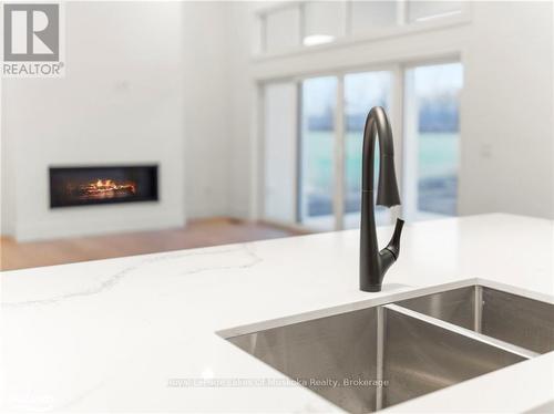 1778 Warminster Side Road, Oro-Medonte (Warminister), ON - Indoor Photo Showing Kitchen With Fireplace