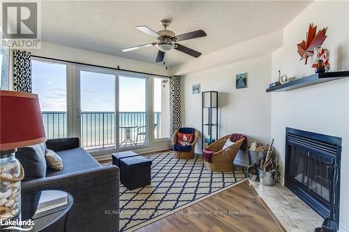 8 - 1064 Tiny Beaches Road S, Tiny, ON - Indoor Photo Showing Living Room With Fireplace