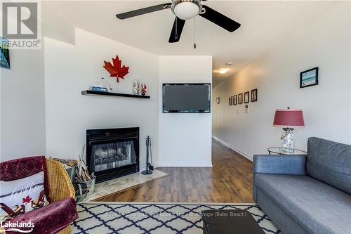 8 - 1064 Tiny Beaches Road S, Tiny, ON - Indoor Photo Showing Living Room With Fireplace