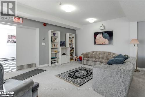 8 - 1064 Tiny Beaches Road S, Tiny, ON - Indoor Photo Showing Living Room