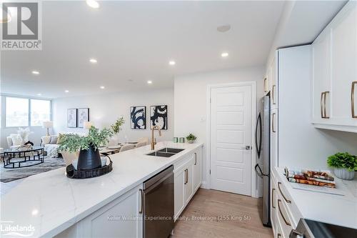 608 - 75 Ellen Street, Barrie (City Centre), ON - Indoor Photo Showing Kitchen With Double Sink