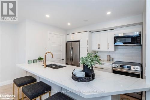 608 - 75 Ellen Street, Barrie (City Centre), ON - Indoor Photo Showing Kitchen With Double Sink With Upgraded Kitchen