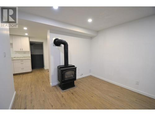 322-326 Ewert Street, Prince George, BC - Indoor Photo Showing Other Room With Fireplace