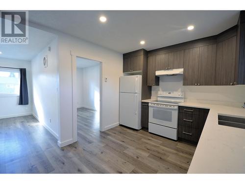 322-326 Ewert Street, Prince George, BC - Indoor Photo Showing Kitchen With Double Sink