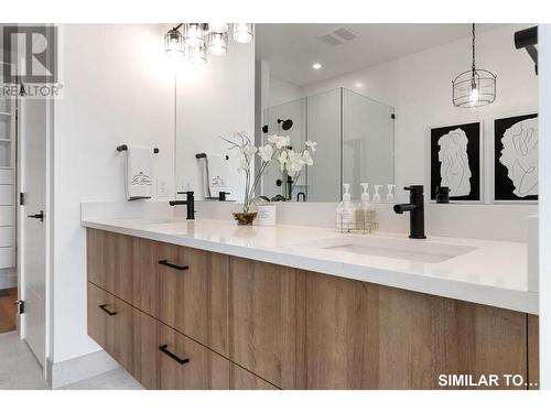 Large Floating Vanity in Ensuite w two sinks - 9201 Okanagan Centre Road W Unit# 5, Lake Country, BC - Indoor Photo Showing Bathroom