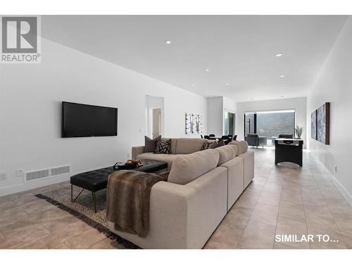 Lower Living Room with 10 ft ceilings - 9201 Okanagan Centre Road W Unit# 5, Lake Country, BC - Indoor Photo Showing Living Room