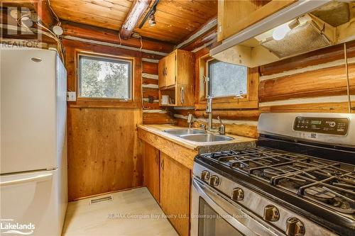 49 Third Street, Tiny, ON - Indoor Photo Showing Kitchen With Double Sink