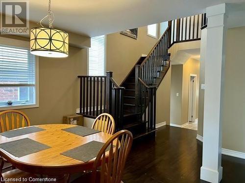 Dining area featuring dark hardwood / wood-style floors - 683 Robert Ferrie Drive, Kitchener, ON - Indoor Photo Showing Dining Room