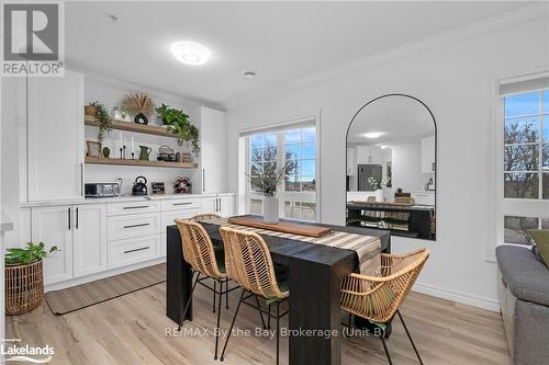 201 - 112 Simcoe Road, Bradford West Gwillimbury (Bradford), ON - Indoor Photo Showing Dining Room