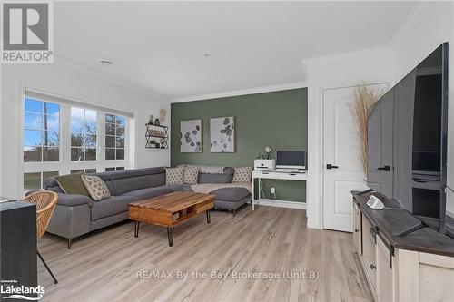 201 - 112 Simcoe Road, Bradford West Gwillimbury (Bradford), ON - Indoor Photo Showing Living Room