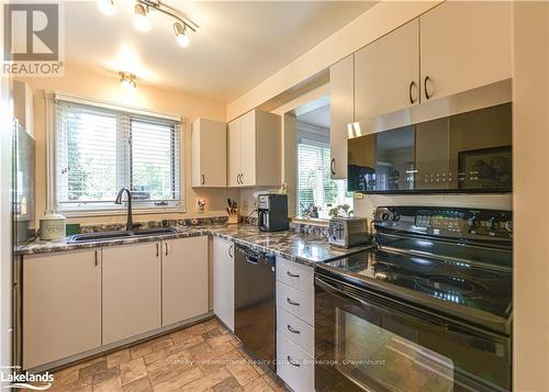 101 - 10 Museum Drive, Orillia, ON - Indoor Photo Showing Kitchen With Double Sink