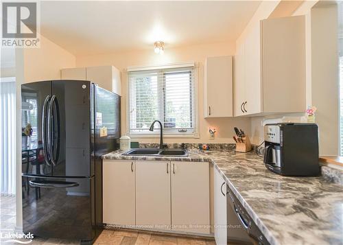 101 - 10 Museum Drive, Orillia, ON - Indoor Photo Showing Kitchen With Double Sink