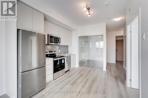 613 - 1440 Clarriage Court, Milton, ON - Indoor Photo Showing Kitchen With Stainless Steel Kitchen