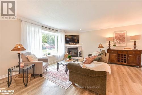 4693 Daniel Street, Ramara (Atherley), ON - Indoor Photo Showing Living Room With Fireplace