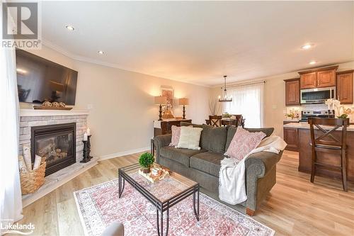 4693 Daniel Street, Ramara (Atherley), ON - Indoor Photo Showing Living Room With Fireplace