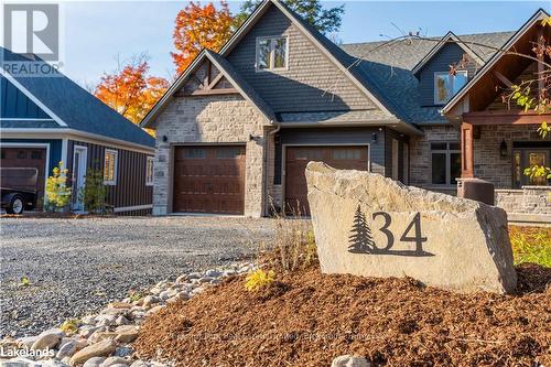 34 St Georges Court, Huntsville (Chaffey), ON - Outdoor With Facade