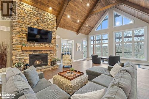 34 St Georges Court, Huntsville (Chaffey), ON - Indoor Photo Showing Living Room With Fireplace