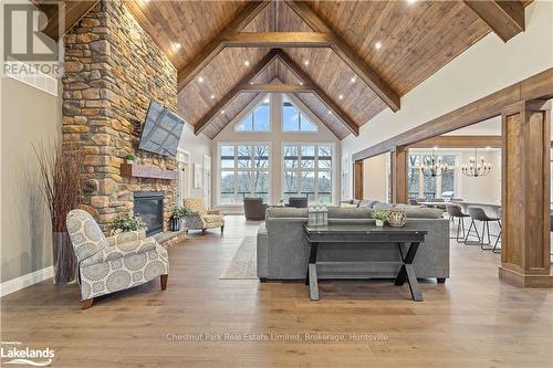 34 St Georges Court, Huntsville (Chaffey), ON - Indoor Photo Showing Living Room With Fireplace