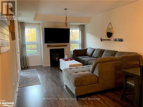 102 - 4 Cove Court, Collingwood, ON - Indoor Photo Showing Living Room With Fireplace