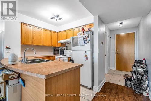 2103 - 60 Brian Harrison Way, Toronto, ON - Indoor Photo Showing Kitchen With Double Sink