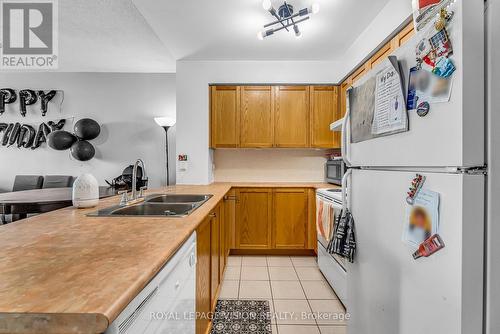 2103 - 60 Brian Harrison Way, Toronto, ON - Indoor Photo Showing Kitchen With Double Sink