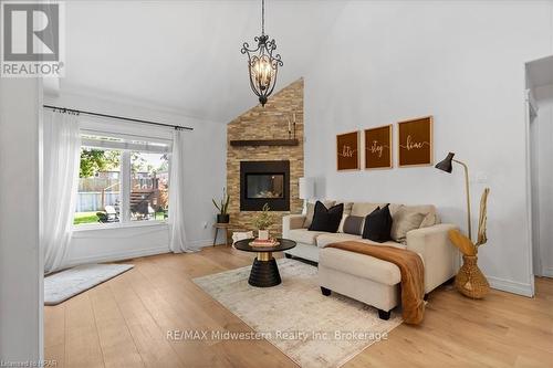 125 Armstrong Street W, North Perth (Listowel), ON - Indoor Photo Showing Living Room With Fireplace