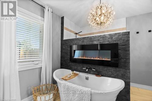 125 Armstrong Street W, North Perth (Listowel), ON - Indoor Photo Showing Bathroom With Fireplace