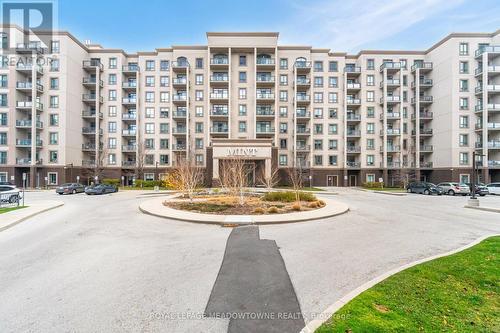 406 - 2490 Old Bronte Road E, Oakville, ON - Outdoor With Balcony With Facade