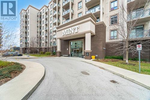 406 - 2490 Old Bronte Road E, Oakville, ON - Outdoor With Balcony With Facade