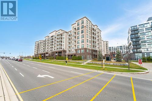 406 - 2490 Old Bronte Road E, Oakville, ON - Outdoor With Facade