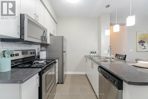 406 - 2490 Old Bronte Road E, Oakville, ON - Indoor Photo Showing Kitchen With Double Sink