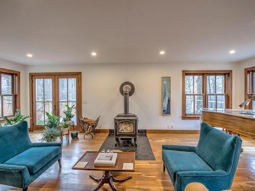 Living room - 1325 Rue Moreau, Prévost, QC - Indoor Photo Showing Living Room With Fireplace