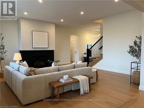 958 Bogdanovic Way, Huron-Kinloss, ON - Indoor Photo Showing Living Room With Fireplace