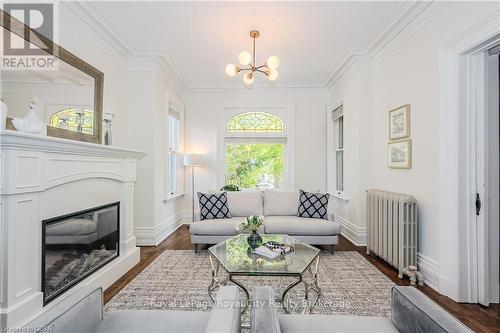 138 Dublin Street N, Guelph (Exhibition Park), ON - Indoor Photo Showing Living Room With Fireplace