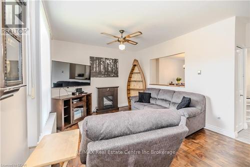 32 Walnut Lane, Brant, ON - Indoor Photo Showing Living Room With Fireplace