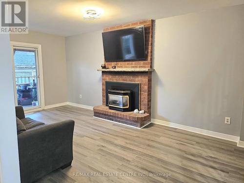 486 Dicenzo Drive, Hamilton, ON - Indoor Photo Showing Living Room With Fireplace