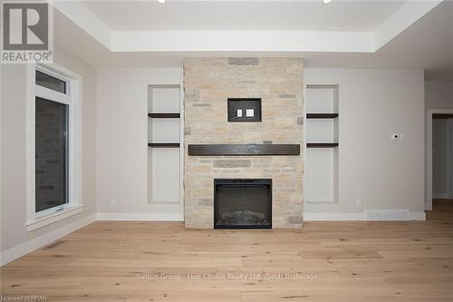 15 Kastner Street, Stratford (Ellice), ON - Indoor Photo Showing Living Room With Fireplace