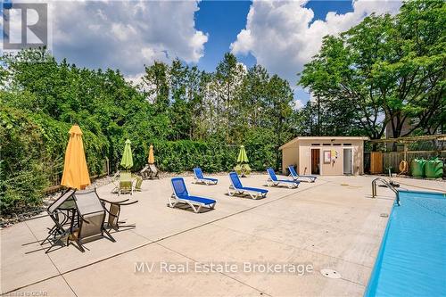 402 - 93 Westwood Road, Guelph (West Willow Woods), ON - Outdoor With In Ground Pool