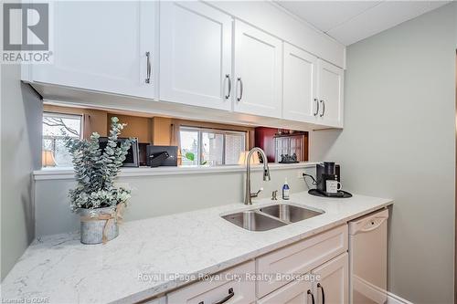 401 - 8 Christopher Court, Guelph (Hanlon Creek), ON - Indoor Photo Showing Kitchen With Double Sink