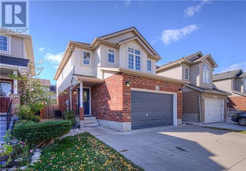 View of property with a garage - 83 Bridlewreath Street, Kitchener, ON - Outdoor With Facade