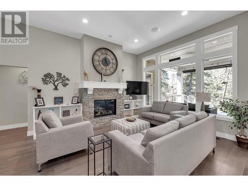 224 Lost Creek Court, Kelowna, BC - Indoor Photo Showing Living Room With Fireplace