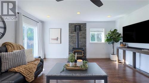 14782 Sixteen Mile Road, Middlesex Centre, ON - Indoor Photo Showing Living Room With Fireplace