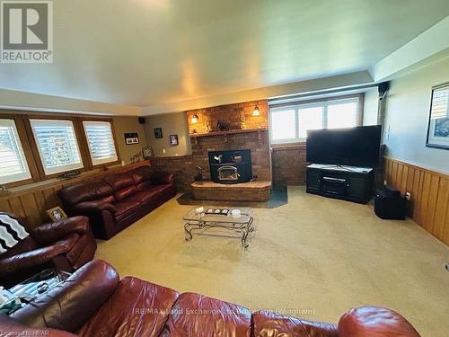 84332 Mcnabb Line, Huron East (Grey), ON - Indoor Photo Showing Living Room With Fireplace