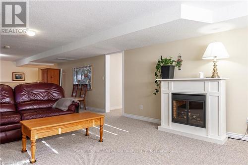 187 Blenheim Court, West Perth (Mitchell), ON - Indoor Photo Showing Living Room With Fireplace