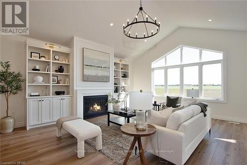 73588 Irene Crescent, Bluewater (Hay), ON - Indoor Photo Showing Living Room With Fireplace