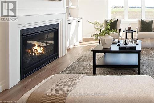 73588 Irene Crescent, Bluewater (Hay), ON - Indoor Photo Showing Living Room With Fireplace