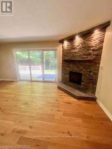 86 Moore Street, Northern Bruce Peninsula, ON - Indoor Photo Showing Living Room With Fireplace