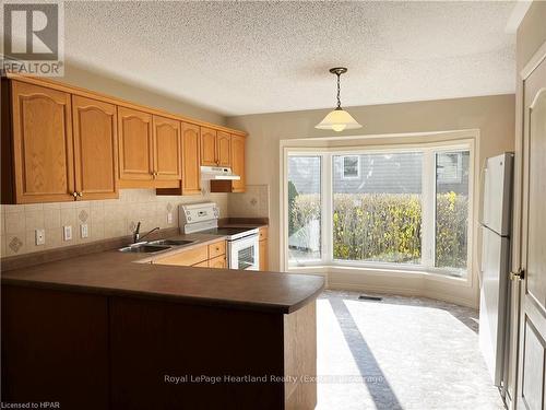 9 - 30 Ann Street, St. Marys, ON - Indoor Photo Showing Kitchen With Double Sink