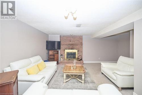 118 Rockwood Avenue, St. Catharines (455 - Secord Woods), ON - Indoor Photo Showing Living Room With Fireplace